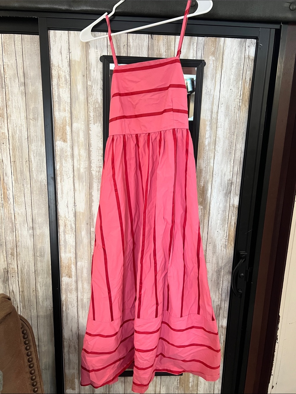 Pink dress with red stripes
